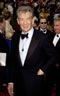 On the red carpet at the Oscars: Ian McKellen, Jack Morrissey, Keith Stern.  Sir Ians wardrobe by <a href=http://www.johnvarvatos.com target =_blank>John Varvatos</a>.