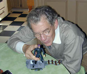 With Magneto action figure