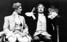Tim Curry (right: Mozart) lectures Ian McKellen (Salieri) on composition.