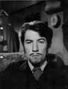 The grown-up Leonidik in false beard and moustache