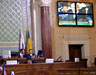 Sir Ian on the monitors as he addresses the Los Angeles City Council, 18 January 2002