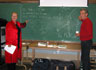 For their appearance with the Gay Mens Chorus at Everett Middle School in San Francisco, Sharon Gless (Cagney & Lacey Queer as Folk) and Ian McKellen shared a dressing room in a converted classroom.  In between shows they autographed the blackboard.