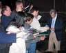 Signing autographs for fans outside auditorium following SAG Conversations