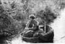 Roger the Bandit (Ian McKellen) paddling his kayak in an Irish backwater.