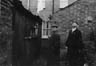 Walter (Ian McKellen) with his father (Arthur Whybrow), waiting in the backyard for their tame pigeons to fly home.