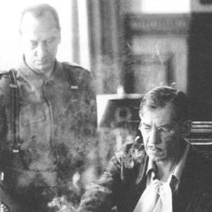 Ratcliffe pours coffee for his officer, Richard