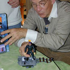 Playing with Magneto action figure